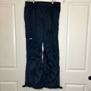 Cabela’s XL nylon black outdoor rain pants. Thin. Ankle zip and snap!